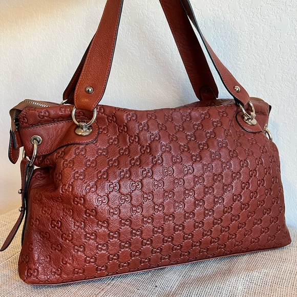 Gucci Monogram Leather Duffle